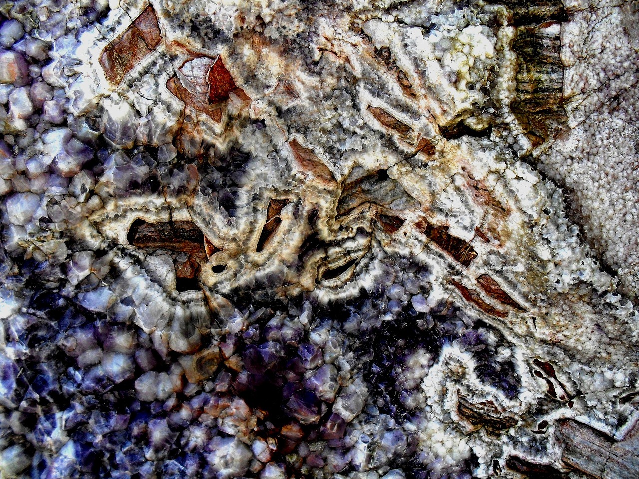semi-precious, agate conglomerate, reds, greens, purples, banding, rough, textured, chrystals embedded, patterns