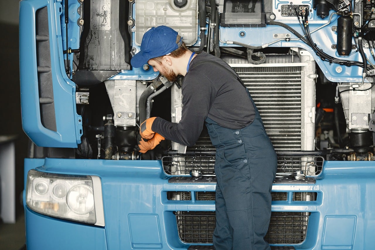mechanic, maintenance, truck, automotive, engine, repair, service, professional, technique, worker, powerunit, oil filter, service station, technical inspection, employee, diagnostics, job, engine repair, work uniform